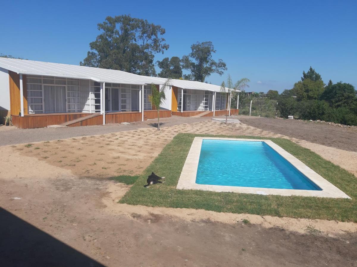 Hotel TERRAZAS del rio Negro Centenario Esterno foto